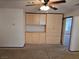 Bonus room with built-in cabinets and access to other rooms at 1113 Dawn Valley Dr, North Las Vegas, NV 89031