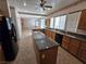 Kitchen with granite island and stainless steel appliances at 1113 Dawn Valley Dr, North Las Vegas, NV 89031