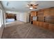 Spacious living room with built-in shelving and carpet at 1113 Dawn Valley Dr, North Las Vegas, NV 89031