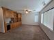 Living room with built-in shelving and carpet at 1113 Dawn Valley Dr, North Las Vegas, NV 89031