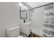 This bathroom features a modern vanity and shower with black accents at 1212 Reynolds Ave, North Las Vegas, NV 89030