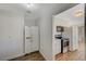 Kitchen area with updated appliances and flooring at 1212 Reynolds Ave, North Las Vegas, NV 89030