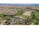 Aerial view of community with golf course and clubhouse at 140 Cora Hills Ct, Las Vegas, NV 89148