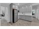 Basement kitchenette with gray cabinets and white countertops at 1606 Dire Wolf Ave, North Las Vegas, NV 89084