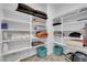 Well-organized linen closet with shelving at 1606 Dire Wolf Ave, North Las Vegas, NV 89084