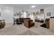 Spacious living room with brown couches and a large mirror at 1606 Dire Wolf Ave, North Las Vegas, NV 89084