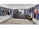 Spacious walk-in closet with ample hanging space and drawers at 1606 Dire Wolf Ave, North Las Vegas, NV 89084