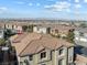 Aerial view of a townhouse community, showcasing mountain views and surrounding landscape at 20 Red Oak Canyon St # 3, Henderson, NV 89012