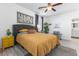 Lovely bedroom with a king bed and yellow bedding at 20 Red Oak Canyon St # 3, Henderson, NV 89012