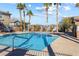 Inviting community swimming pool with surrounding patio space at 20 Red Oak Canyon St # 3, Henderson, NV 89012