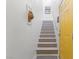 Modern staircase with gray painted risers and white walls at 20 Red Oak Canyon St # 3, Henderson, NV 89012