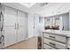 Modern kitchen with white cabinets and a breakfast nook at 2039 Waverly Cir, Henderson, NV 89014