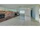 Living room with brick fireplace and mirrored wall at 2108 Kirk Ave, Las Vegas, NV 89101