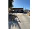 Ranch style home with driveway and gated entrance at 217 Jackson Ave, Las Vegas, NV 89106