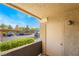 Private balcony with view of parking and landscaping at 2300 Silverado Ranch Blvd # 1070, Las Vegas, NV 89183