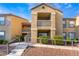 Two-story building with stairs and landscaping at 2300 Silverado Ranch Blvd # 1070, Las Vegas, NV 89183