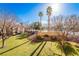 Landscaped grounds with grassy areas and mature trees at 2300 Silverado Ranch Blvd # 1070, Las Vegas, NV 89183