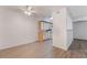 Simple dining area with laminate flooring and view to kitchen at 2300 Silverado Ranch Blvd # 1070, Las Vegas, NV 89183