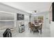 Cozy breakfast nook with a round table and sliding glass doors at 2413 Hidden Glen Ct, Las Vegas, NV 89134