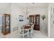 Elegant dining room featuring a chandelier and a classic wooden table at 2413 Hidden Glen Ct, Las Vegas, NV 89134