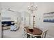 Open concept dining room with view of living room and kitchen at 2413 Hidden Glen Ct, Las Vegas, NV 89134