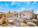 Spacious backyard with covered patio and flagstone at 2568 Dirleton Pl, Henderson, NV 89044