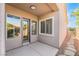 Covered patio with door and windows at 2568 Dirleton Pl, Henderson, NV 89044