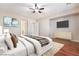 Main bedroom with hardwood floors and stylish decor at 2568 Dirleton Pl, Henderson, NV 89044