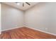 Hardwood floor bedroom with ceiling fan at 2568 Dirleton Pl, Henderson, NV 89044