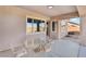 Covered patio with seating area and view of backyard at 2568 Dirleton Pl, Henderson, NV 89044