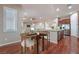 Charming dining area near kitchen with hardwood floors at 2568 Dirleton Pl, Henderson, NV 89044