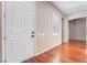 Bright entryway with hardwood floors and neutral wall tones at 2568 Dirleton Pl, Henderson, NV 89044