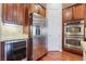 Kitchen with stainless steel appliances and hardwood floors at 2568 Dirleton Pl, Henderson, NV 89044