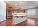 Kitchen features granite countertops, stainless steel appliances, and hardwood floors at 2568 Dirleton Pl, Henderson, NV 89044