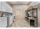 Laundry room with shelving and hanging rack at 2568 Dirleton Pl, Henderson, NV 89044