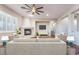 Spacious living room featuring a cozy fireplace and hardwood floors at 2568 Dirleton Pl, Henderson, NV 89044