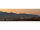 Panoramic view of mountains and city lights at sunset at 2568 Dirleton Pl, Henderson, NV 89044