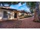 Home exterior showcasing a walkway and mature trees at 2620 San Martin Ct, Las Vegas, NV 89121