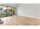 Bright living room with hardwood floors and sliding glass doors leading to a patio at 2620 San Martin Ct, Las Vegas, NV 89121