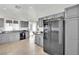 Modern kitchen with gray cabinets, granite countertops, and stainless steel appliances at 2736 Mintlaw Ave, Henderson, NV 89044