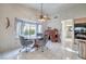 Bright breakfast nook with window seating and wood table at 3128 Pelican Beach Dr, Las Vegas, NV 89117