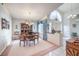 Formal dining room with wood furniture and a chandelier at 3128 Pelican Beach Dr, Las Vegas, NV 89117