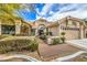 House exterior featuring a walkway and well-manicured landscaping at 3128 Pelican Beach Dr, Las Vegas, NV 89117