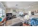 Bright living room featuring a fireplace and built-in shelving at 3128 Pelican Beach Dr, Las Vegas, NV 89117