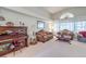 Bright living room featuring a large window and elegant furniture at 3128 Pelican Beach Dr, Las Vegas, NV 89117