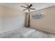 Simple bedroom with ceiling fan and neutral walls at 3217 Joann Way, Las Vegas, NV 89108