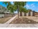 View of the building's exterior with a tree and walkway at 3217 Joann Way, Las Vegas, NV 89108