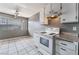 Kitchen with white cabinets, granite countertops, and a window at 3217 Joann Way, Las Vegas, NV 89108