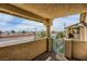 Balcony with gated access and city view at 332 S Buffalo Dr # 202, Las Vegas, NV 89145