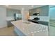 Spacious kitchen featuring modern cabinetry and a large island at 340 Banished Ave # 2, North Las Vegas, NV 89031